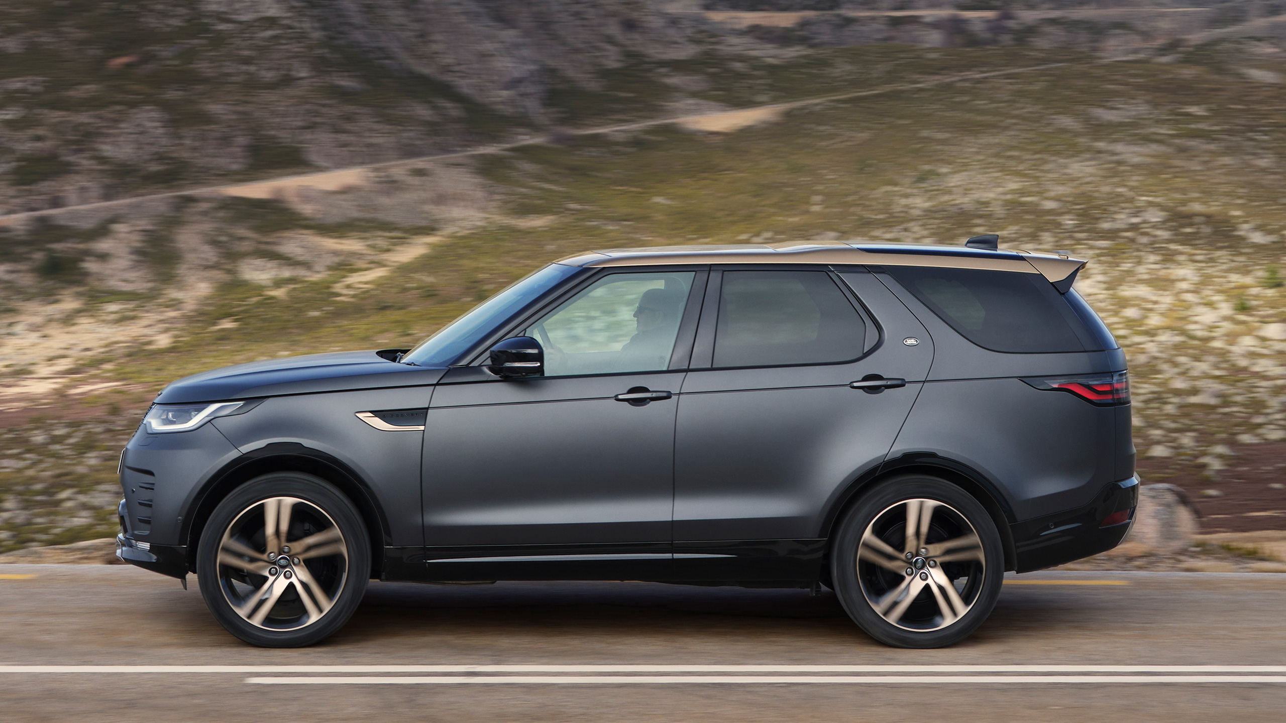 Side view of discovery on road